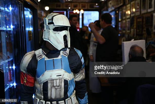 People, dressed with Star Wars movie character costumes pose as Turkish oriented pizza restaurant-chain owner and a three-time World Pizza Spinning...