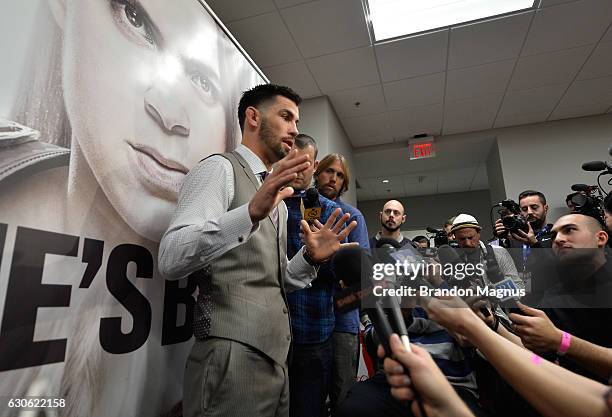 Bantamweight champion Dominick Cruz speaks to the media during the UFC 207 Ultimate Media Day at T-Mobile Arena on December 28, 2016 in Las Vegas,...