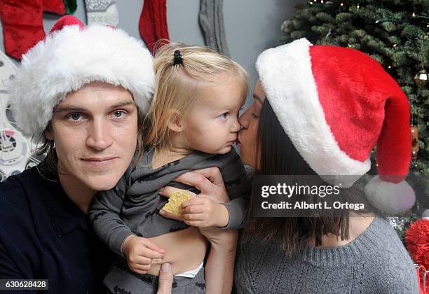 Actor Jason Mewes of Jay and Silent Bob poses with his daughter Logan and wife Jordan Monsanto in front of the Christmas Tree in Los Angeles on...