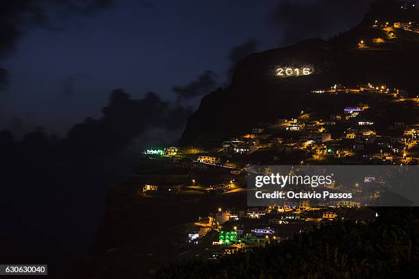 Detail of Christmas lights on the small fishing village of CÃ¢mara de Lobos on December 29, 2016 in Camara de Lobos, Madeira, Portugal.