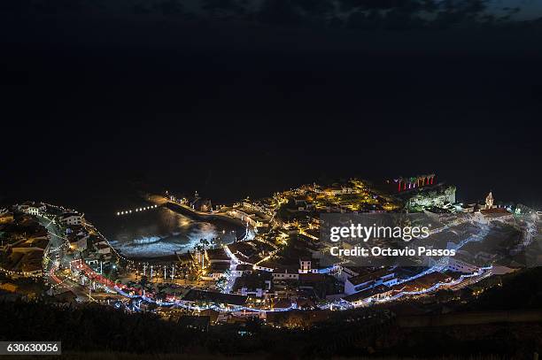 General View of Christmas lights on the small fishing village of CÃ¢mara de Lobos on December 29, 2016 in Camara de Lobos, Madeira, Portugal.