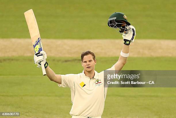 Steven Smith of Australia celebrates as he reaches his century during day four of the Second Test match between Australia and Pakistan at Melbourne...
