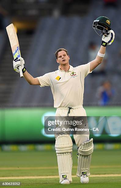 Steve Smith of Australia celebrates making 100 runs during day four of the Second Test match between Australia and Pakistan at Melbourne Cricket...