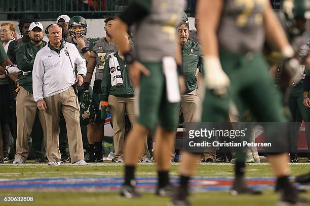Head coach Jim Grobe of the Baylor Bears watches from the sidelines during the Motel 6 Cactus Bowl against the Boise State Broncos at Chase Field on...