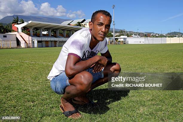 As Excelsior's defender from Reunion Gael Payet poses on the football field at the Raphael-Babet stadium in Saint-Joseph, on the French Indian Ocean...