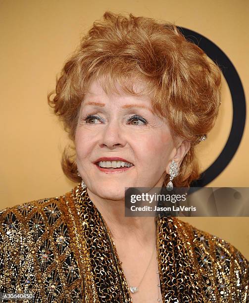 Actress Debbie Reynolds poses in the press room at the 21st annual Screen Actors Guild Awards at The Shrine Auditorium on January 25, 2015 in Los...