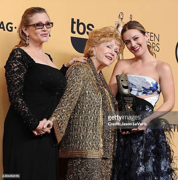 Carrie Fisher, Debbie Reynolds and Billie Catherine Lourd pose in the press room at the 21st annual Screen Actors Guild Awards at The Shrine...