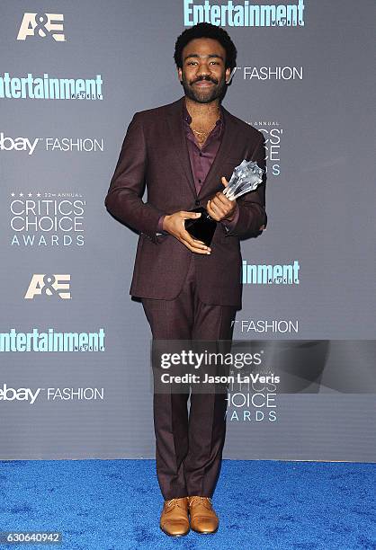 Actor Donald Glover poses in the press room at the 22nd annual Critics' Choice Awards at Barker Hangar on December 11, 2016 in Santa Monica,...