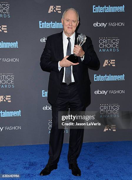 Actor John Lithgow poses in the press room at the 22nd annual Critics' Choice Awards at Barker Hangar on December 11, 2016 in Santa Monica,...