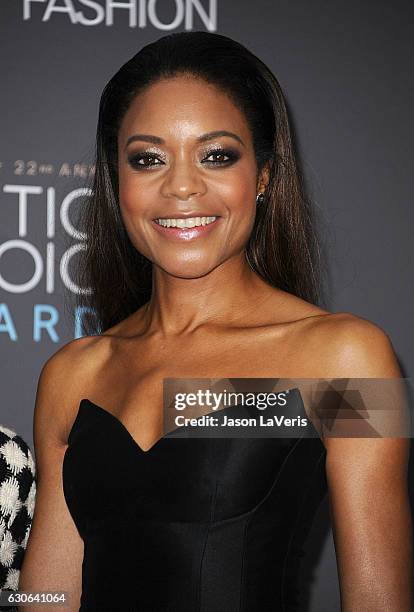 Actress Naomie Harris poses in the press room at the 22nd annual Critics' Choice Awards at Barker Hangar on December 11, 2016 in Santa Monica,...