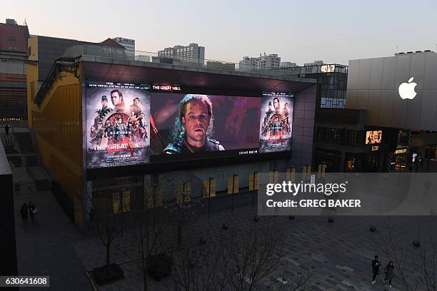 An advertisement for the movie "The Great Wall" is displayed outside a cinema in Beijing on December 29, 2016. Chinese state media have taken popular...