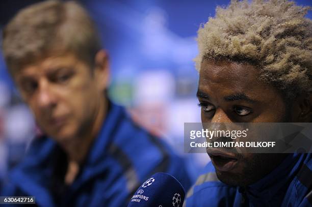 Arsenal's head coach Arsene Wenger and Arsenal's midfielder Alex Song attend a press conference at Partizan Stadium in Belgrade on September 27 on...