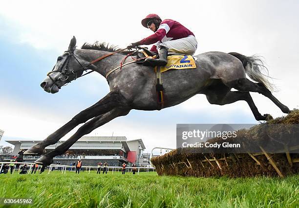 Dublin , Ireland - 29 December 2016; Petit Mouchoir, with Bryan Cooper up, jump the last on their way to winning The Ryanair Hurdle during day four...