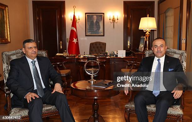 Turkish Foreign Minister Mevlut Cavusoglu meets Former Syrian Prime Minister Riyad Farid Hijab in Ankara, Turkey