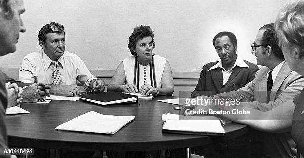 Boston school superintendent Marion Fahey, center, meets with the Board of Superintendents in Boston on Sept. 1, 1975. Seated from front left to...