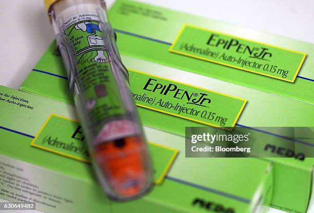 An Epipen Junior epinephrine auto-injector, produced by Meda AB, sits on a pharmacy counter in this arranged photograph in London, U.K., on Thursday,...