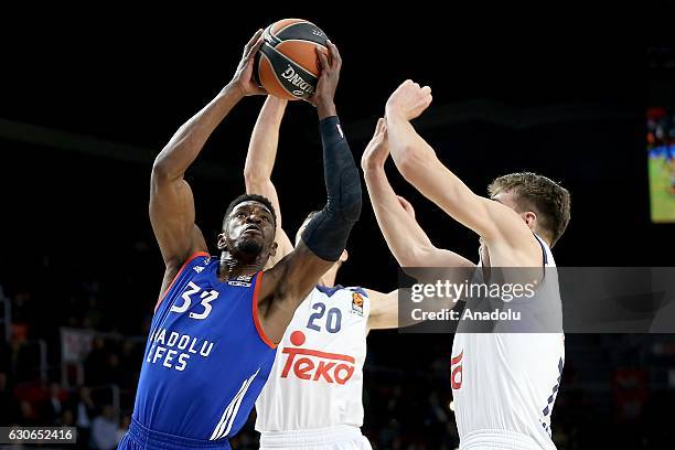 Brandon Paul of Anadolu Efes Istanbul is in action against Jaycee Carroll and Luka Doncic of Real Madrid during the Turkish Airlines Euroleague...