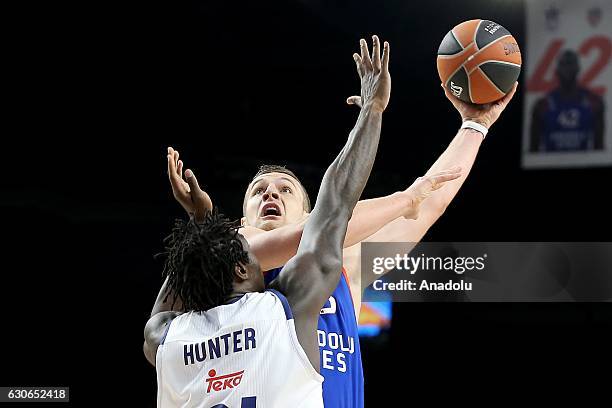 Alen Omic of Anadolu Efes Istanbul is in action against Othello Hunter of Real Madrid during the Turkish Airlines Euroleague Basketball 15th week...