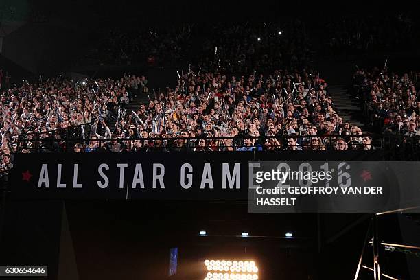 Fans cheer during an All Star Game basketball match of the French Ligue Nationale de Basket between a selection of the best international players...
