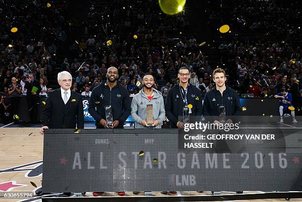 President of the French Ligue Nationale de Basket Alain Beral, France's Jeremy Nzeulie, John Roberson of US, France's Benjamin Sene and Germany's...