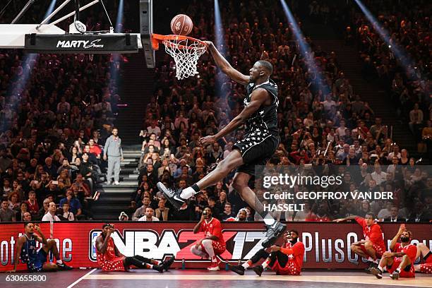 France's Jeremy Nzeulie participates in a Dunk Contest during an All Star Game basketball match of the French Ligue Nationale de Basket between a...