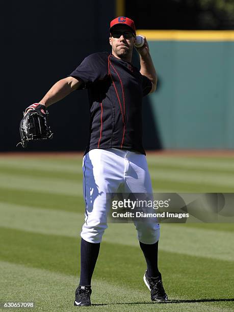 Rightfielder David Murphy of the Cleveland Indians warms up prior to a game against the Toronto Blue Jays on May 1, 2015 at Progressive Field in...