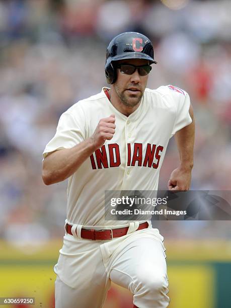 Leftfielder David Murphy of the Cleveland Indians runs toward third base during a game against the Cincinnati Reds on May 24, 2015 at Progressive...