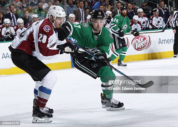 Devin Shore of the Dallas Stars skates against Patrick Wiercioch of the Colorado Avalanche at the American Airlines Center on December 29, 2016 in...