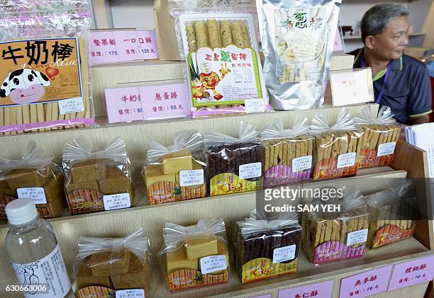 This picture taken on November 17, 2016 shows confectionery made by prison inmates for sale during a prison goods exhibition in central Taichung. If...