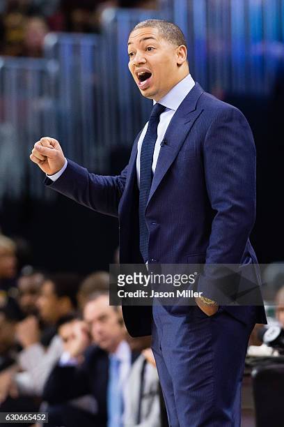Tyronn Lue of the Cleveland Cavaliers yells to his players during the second half against the Boston Celtics at Quicken Loans Arena on December 29,...
