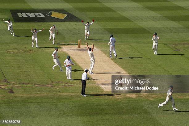 Mitchell Starc of Australia celebrates his last wicket of Yasir Shah to win the match during day five of the Second Test match between Australia and...