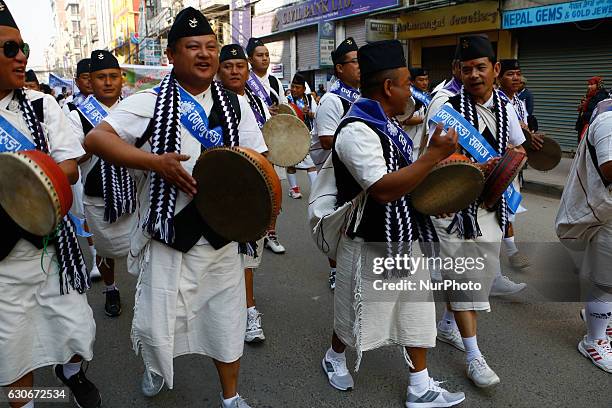 Nepalese from ethnic Gurung Community in traditional attire dance while taking part in parade to mark their New Year also know as Tamu Losar in...