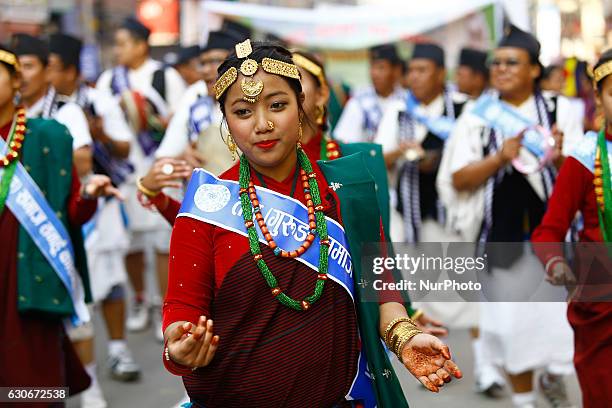 Nepalese from ethnic Gurung Community in traditional attire dance while taking part in parade to mark their New Year also know as Tamu Losar in...