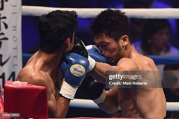 Bruno Sandoval punches Ryota Murata during the non-title bout between Ryota Murata and Bruno Sandoval at the Ariake Colosseum on December 30, 2016 in...