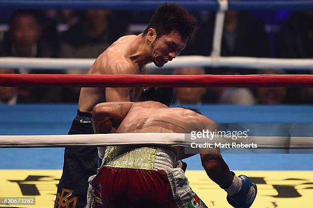 Ryota Murata punches Bruno Sandoval during the non-title bout between Ryota Murata and Bruno Sandoval at the Ariake Colosseum on December 30, 2016 in...