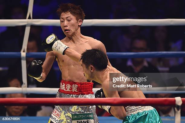 Naoya Inoue avoids a punch by Kohei Kono during the WBO World Super Flyweight Title bout between Naoya Inoue and Kohei Kono of Japan at the Ariake...