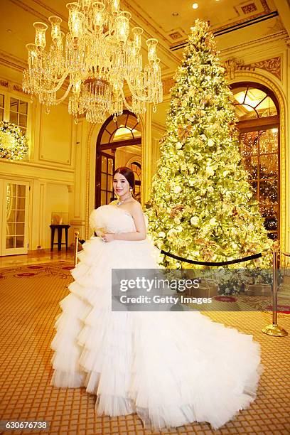 Wendy Yu attends the 62nd anniversary of the International Debutante Ball in the Grand Ballroom of The Pierre in New York City wearing a haute...