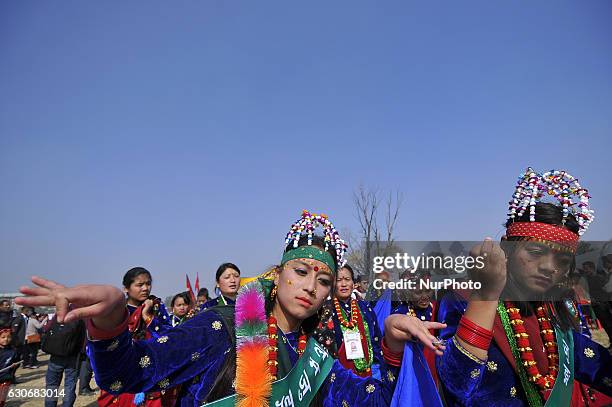 Nepalese Gurung community people dance in a tune of traditional instrument during the celebration of Tamu Lhosar or Losar at Kathmandu, Nepal on...