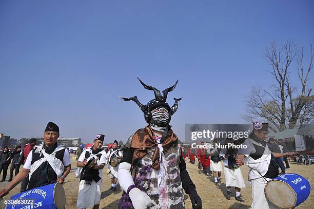 Nepalese Gurung community people dance in a tune of traditional instrument during the celebration of Tamu Lhosar or Losar at Kathmandu, Nepal on...