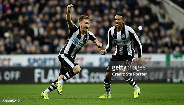 Newcastle player Matt Ritchie celebrates his opening goal with Isaac Hayden during the Sky Bet Championship match between Newcastle United and...