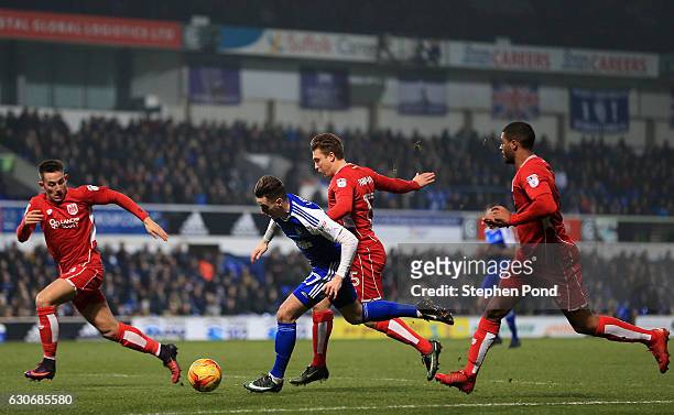 Tom Lawrence of Ipswich Town and Luke Freeman of Bristol City compete for the ball during the Sky Bet Championship match between Ipswich Town and...