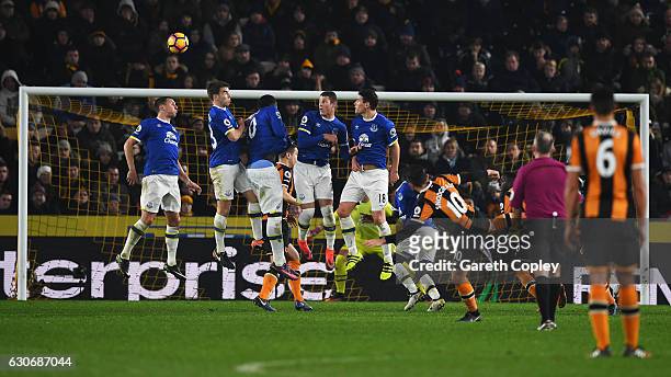 Robert Snodgrass of Hull City scores with a free kick for his team's second goal during the Premier League match between Hull City and Everton at...