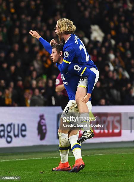 Ross Barkley of Everton celebrates scoring his team's second goal with Tom Davies of Everton during the Premier League match between Hull City and...