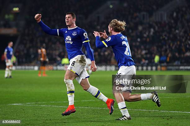 Ross Barkley of Everton celebrates scoring his team's second goal to make the score 2-2 with Tom Davies during the Premier League match between Hull...