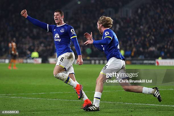 Ross Barkley of Everton celebrates scoring his team's second goal to make the score 2-2 with team-mate Tom Davies during the Premier League match...