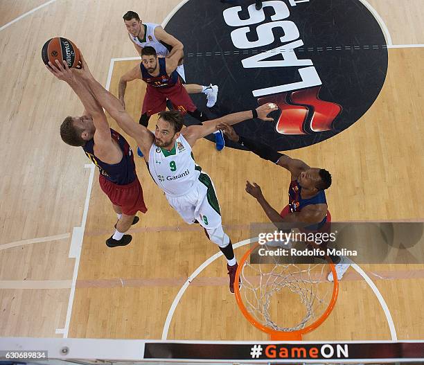 Aleksandar Vezenkov, #14 of FC Barcelona Lassa competes with Semih Erden, #9 of Darussafaka Dogus Istanbul during the 2016/2017 Turkish Airlines...