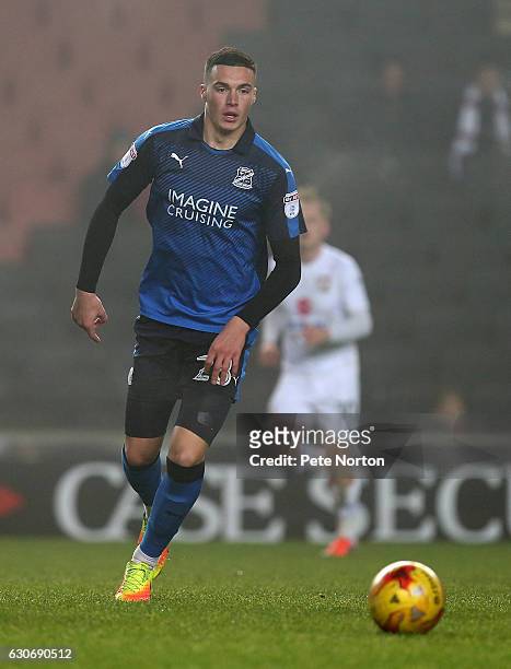 Lloyd Jones of Swindon Town in action during the Sky Bet League One match between Milton Keynes Dons and Swindon Town at StadiumMK on December 30,...
