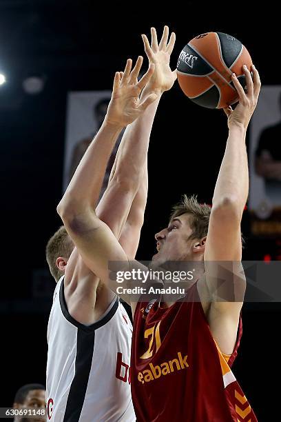 Tibor Pleiss of Galatasaray Odeabank in action against Leon Radosevic of Brose Bamberg during Euroleague basketball match between Galatasaray...