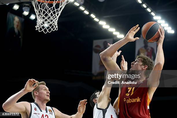 Tibor Pleiss of Galatasaray Odeabank in action against Leon Radosevic of Brose Bamberg during Euroleague basketball match between Galatasaray...