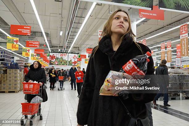 Moscouvits are buying food during New Year eve shopping at the Auchan food store at Aviapark mall in Moscow, Russia, December 2016.